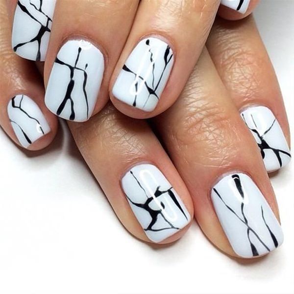 Cracked black and white nail designs