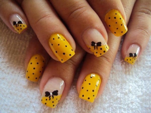 yellow with black dots nail ideas