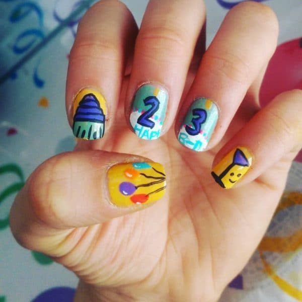 Yellow And Aqua Nail design for birthday