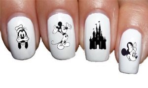 White oval nails with cartoon Minnie and Mickey Mouse, castle art, glossy finish.