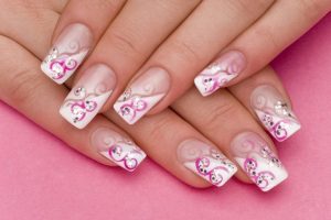 Square-shaped, medium length, pink and white palette, glossy finish.