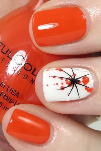 white and orange nail design