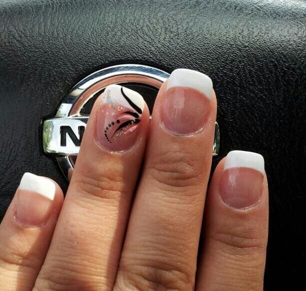 french tip nails with ring finger design