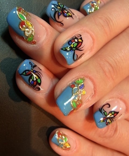 blue butterfly nail design