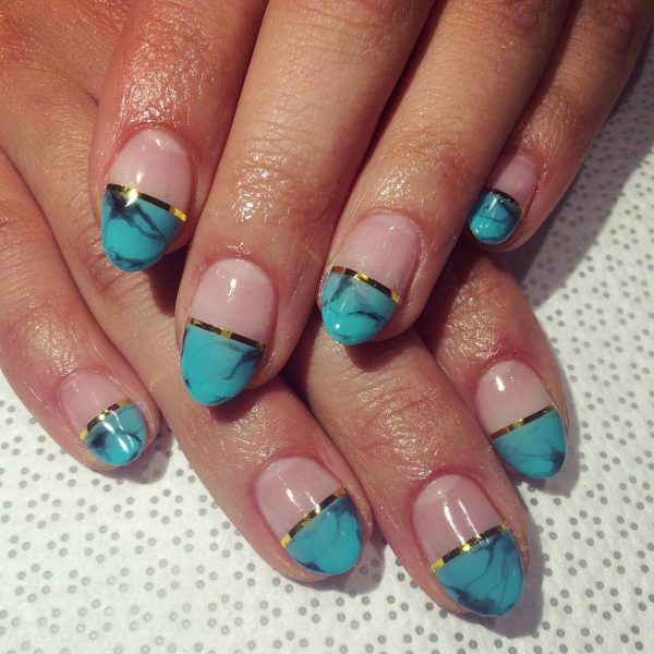 turquoise gold nail design