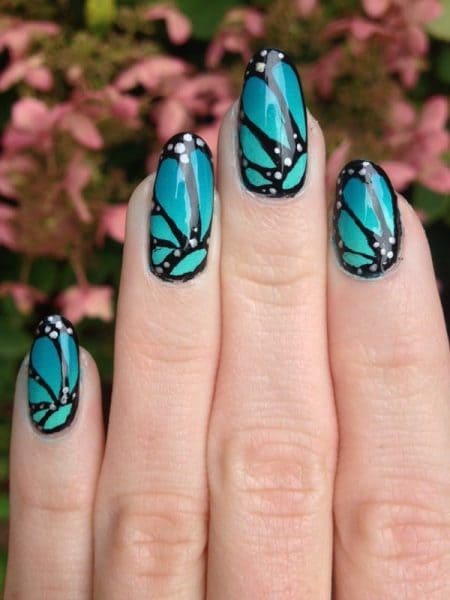 blue wings butterfly nail design