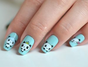 Short square nails with light blue polish.