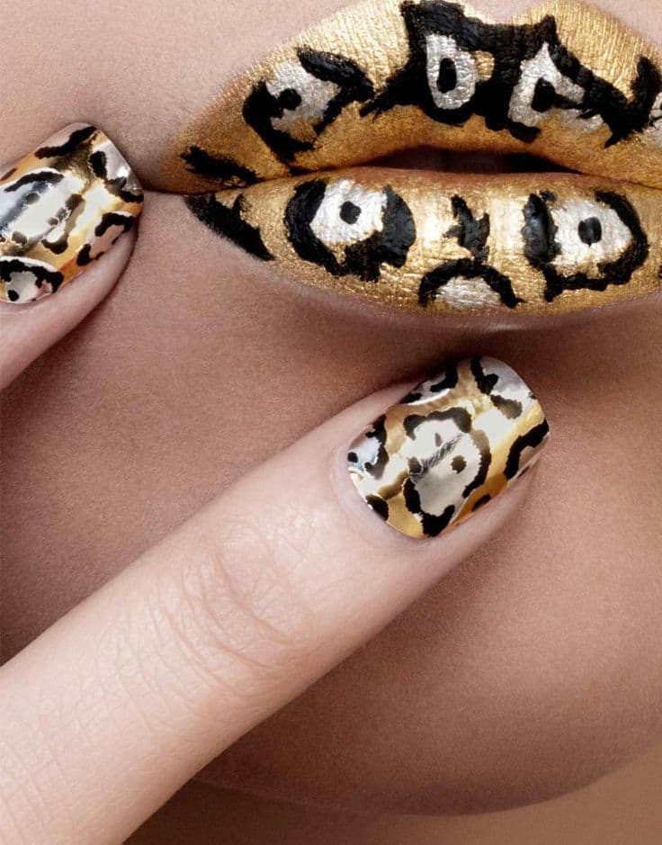 Black and Gold Cheetah Nail art