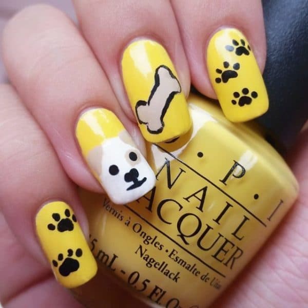 Yellow Bone dog nail art 