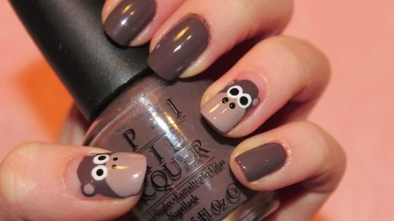 animal print nail design with funny monkey 