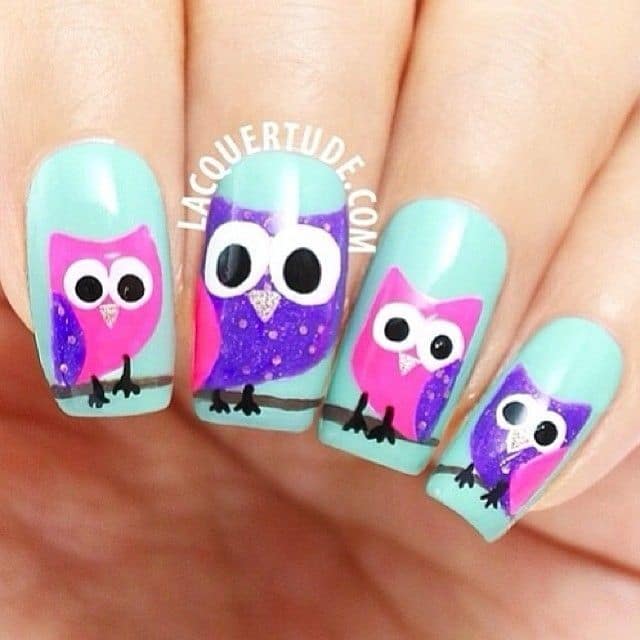 young girl favorite owl nail design