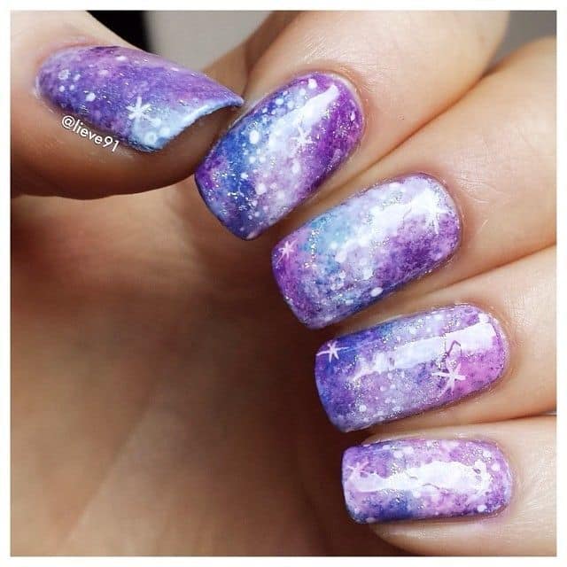 Purple color Galaxy Nail Design