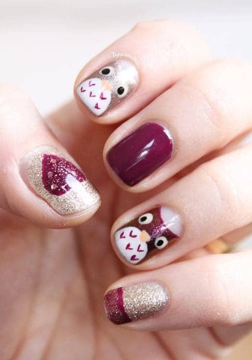 Burgundy owl nail art