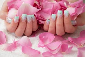 Soft pastel green and pink gradient, floral accents, matte finish, square shape.