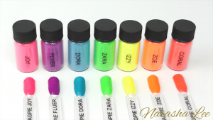 Short, oval-shaped nails, colorful palette, glossy finish.