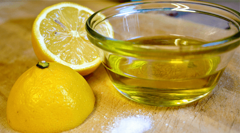 Bowl of Olive Oil and a Lemon