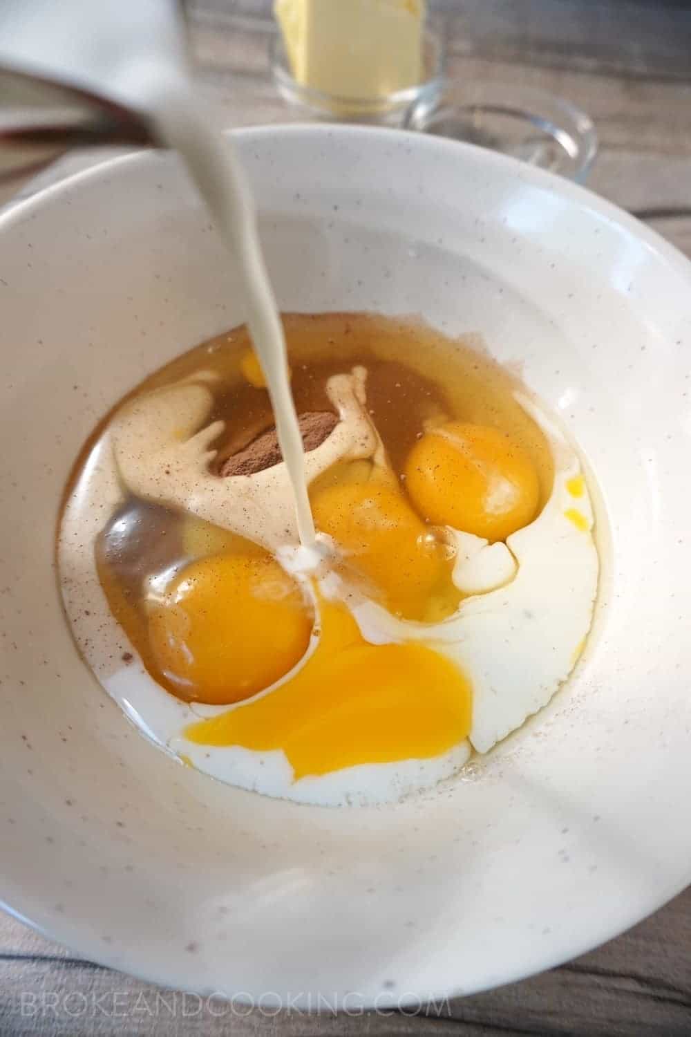 Eggs Mixed With Milk in a Bowl