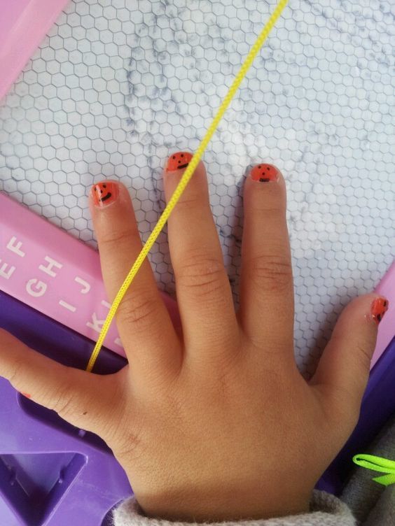 orange color nail polish design for baby