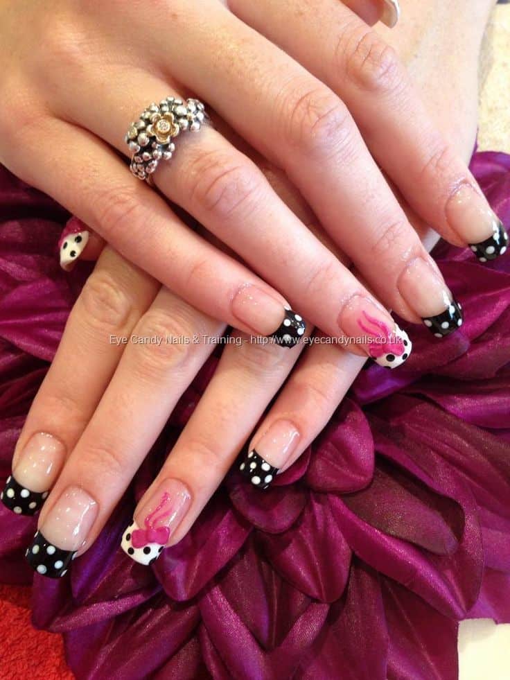 Polka dot bow nail art