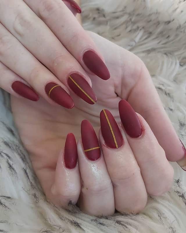 maroon color oval nails polish