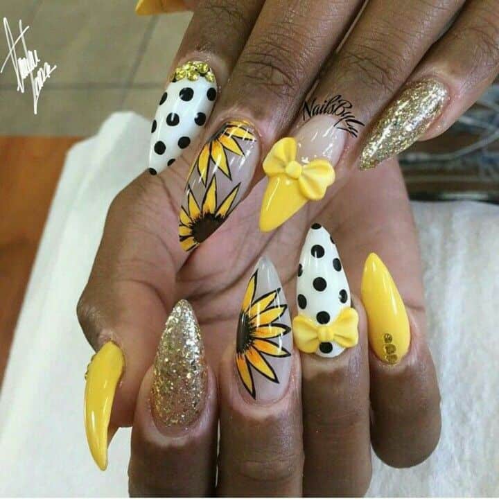 Sunflower art in stiletto nails