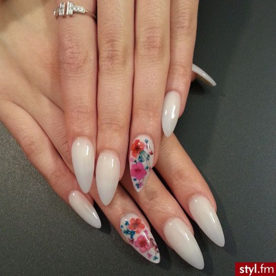 Flower design in Nude stiletto Nails