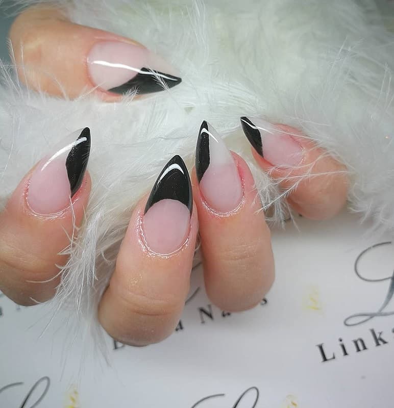 nude and black stiletto nails