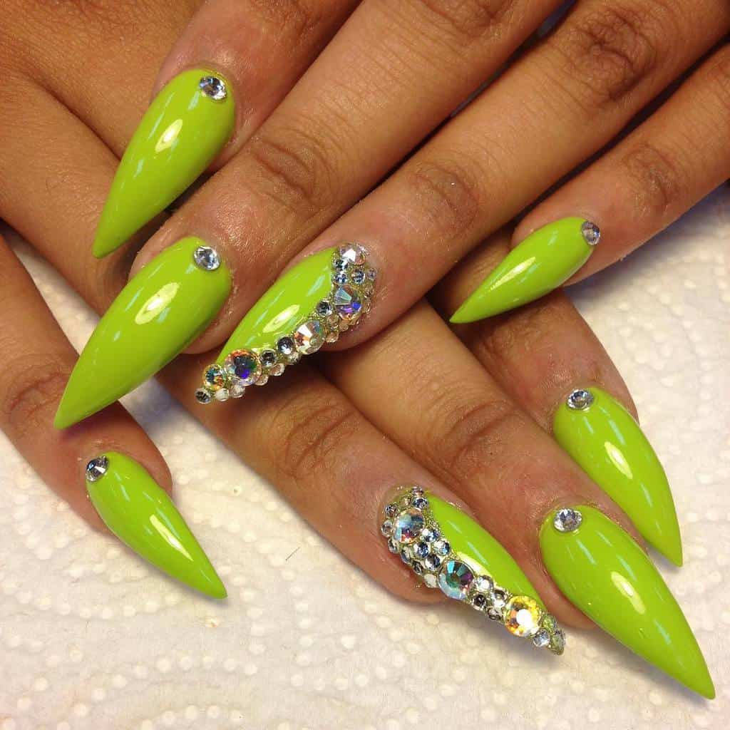 neon green color stiletto nails with stones