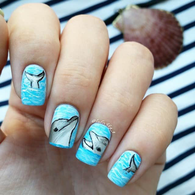 Peeping dolphin on the nail