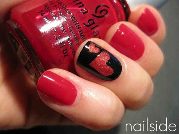 red and black heart shape nail design