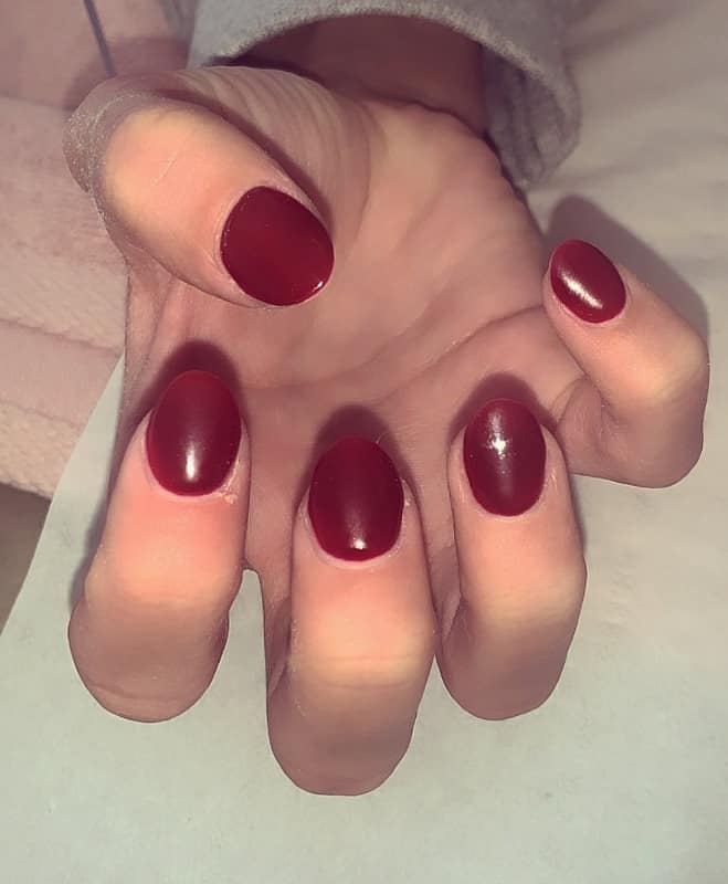 round acrylic dark red nails