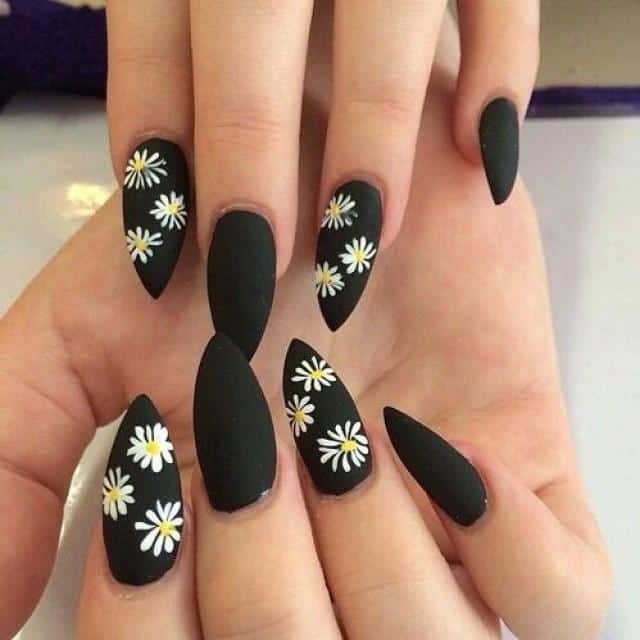 Daisy art on Matte Black Stiletto nail