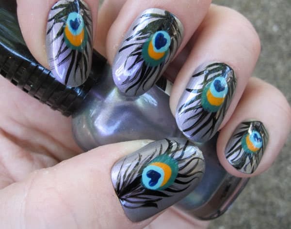 hand painted peacock feather nail art