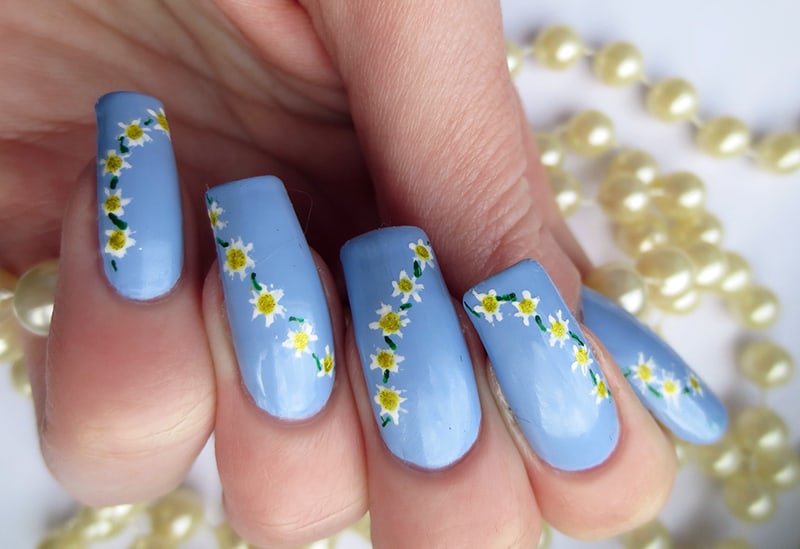 Daisy Art on Blue Ballerina Nail