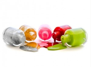 Almond-shaped, medium length, vibrant color palette, glossy finish, abstract nail art, playful and modern style.