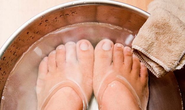 soaking feet in warm water