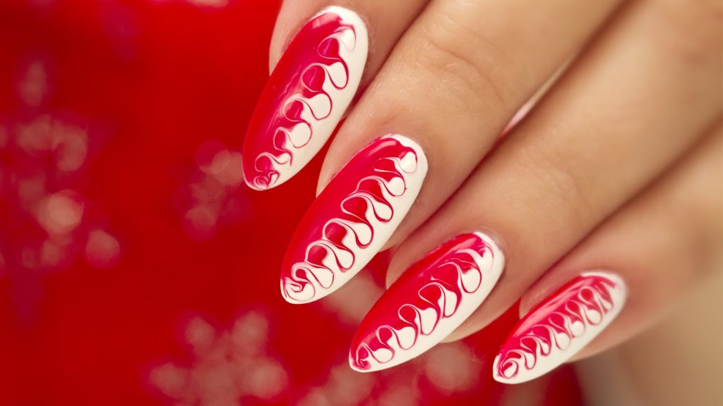 red and white swirl nail art