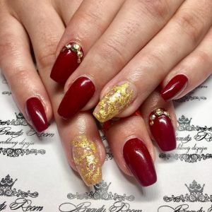 25 Flattering Red And Gold Nail Designs for 2024