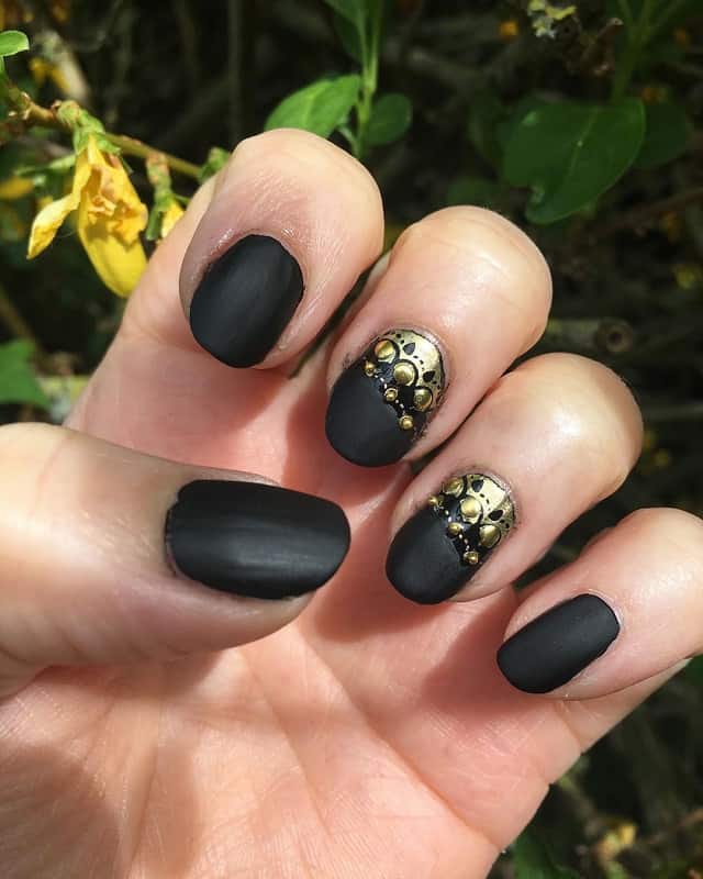 black matte nails with gold studs