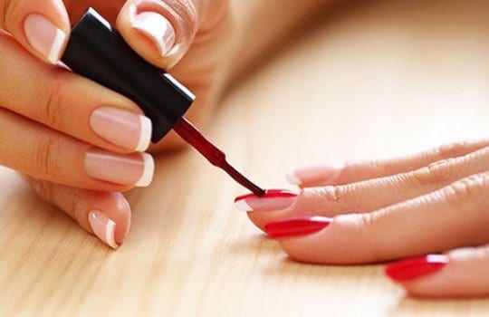 Nail Enamel Application apply two thin layers of nail paint