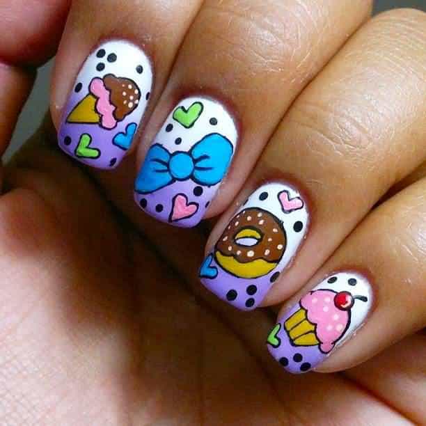 tooth cupcake nails