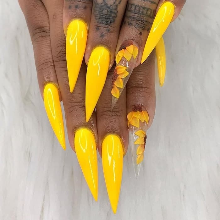 yellow nails with sunflower design