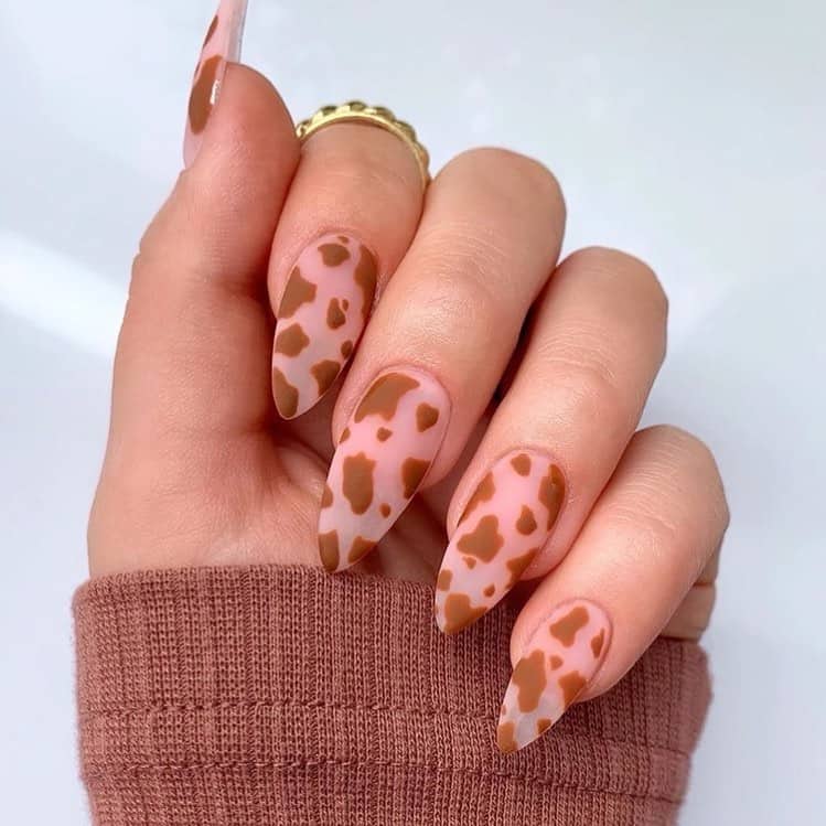 negative space cow print nail art