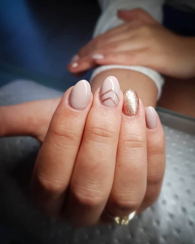 beige nails with glitter