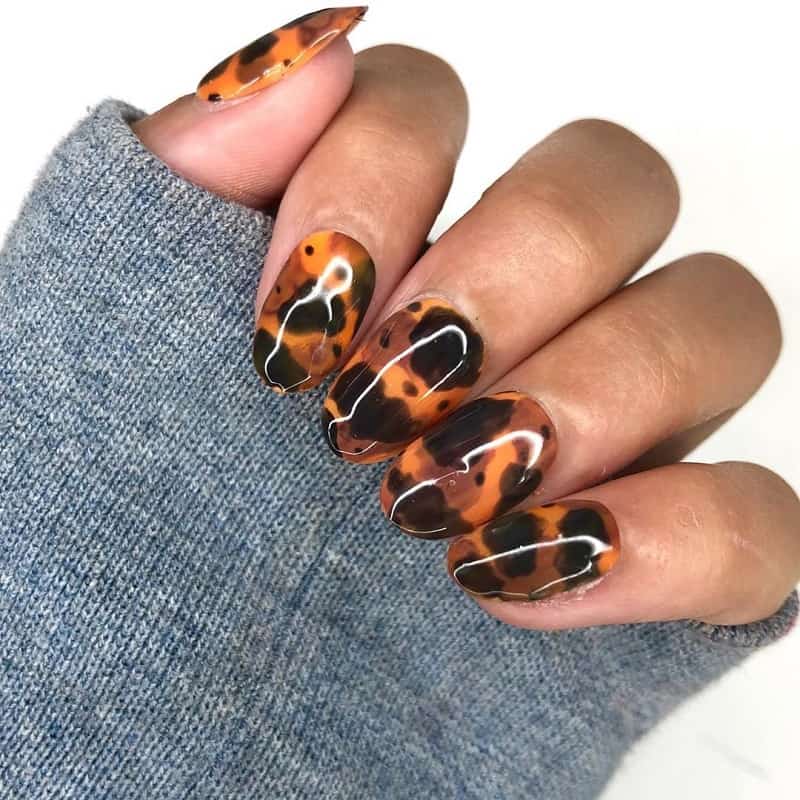 brown and orange nail design