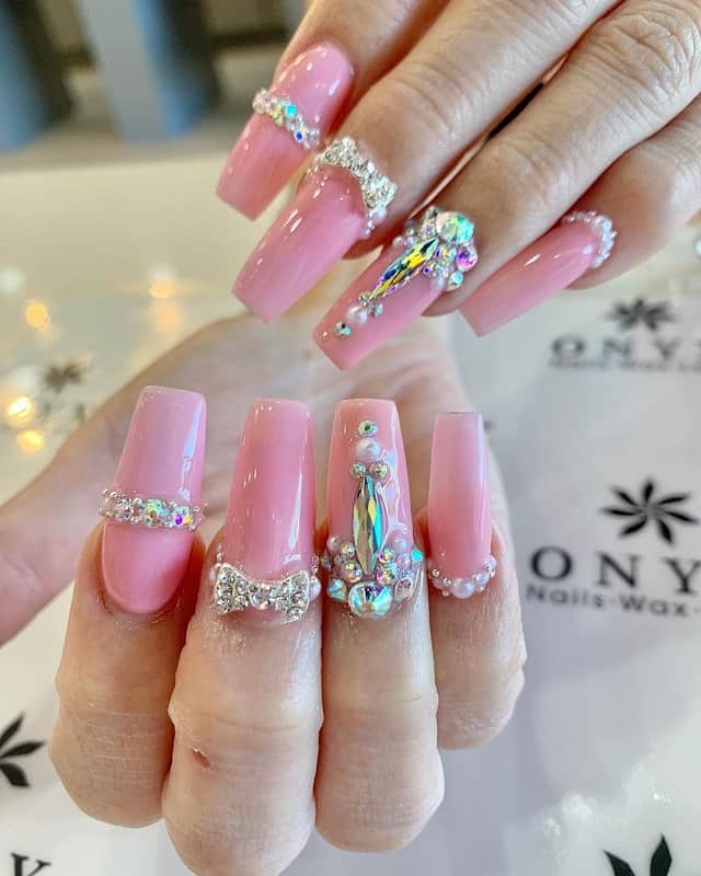 nails design with bow and rhinestones