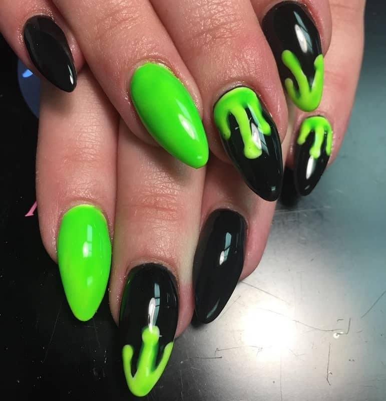 black and lime green nails