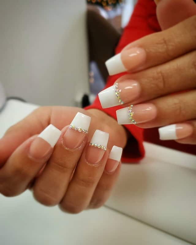 french nail design with diamonds