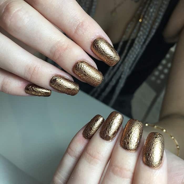 gold shellac nail design