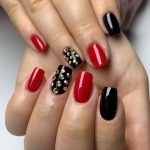 black and red nails with gems